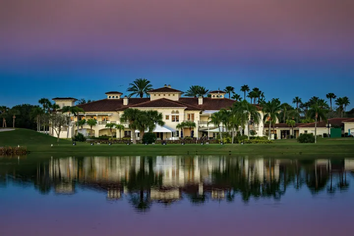 The elegant Grand Harbor main clubhouse serves as the community's social heart, offering premier dining experiences and a fully appointed pro shop.