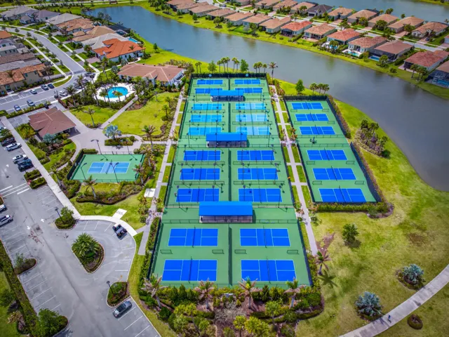 Extensive recreational facilities featuring multiple tennis courts and pickleball courts
