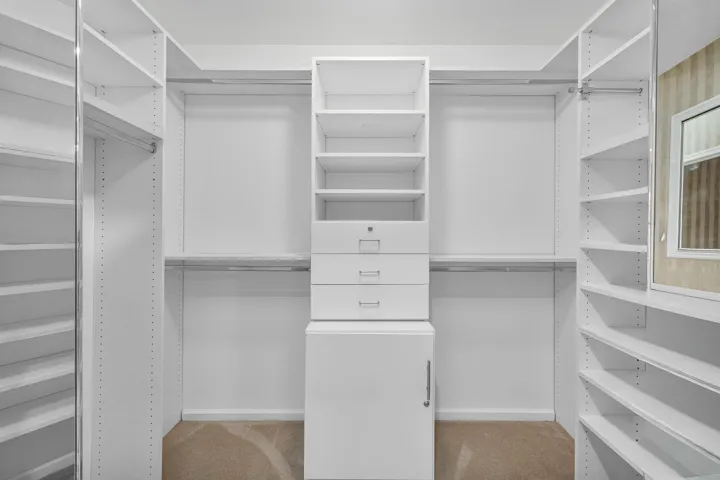 CUSTOM BUILT PRIMARY CLOSET