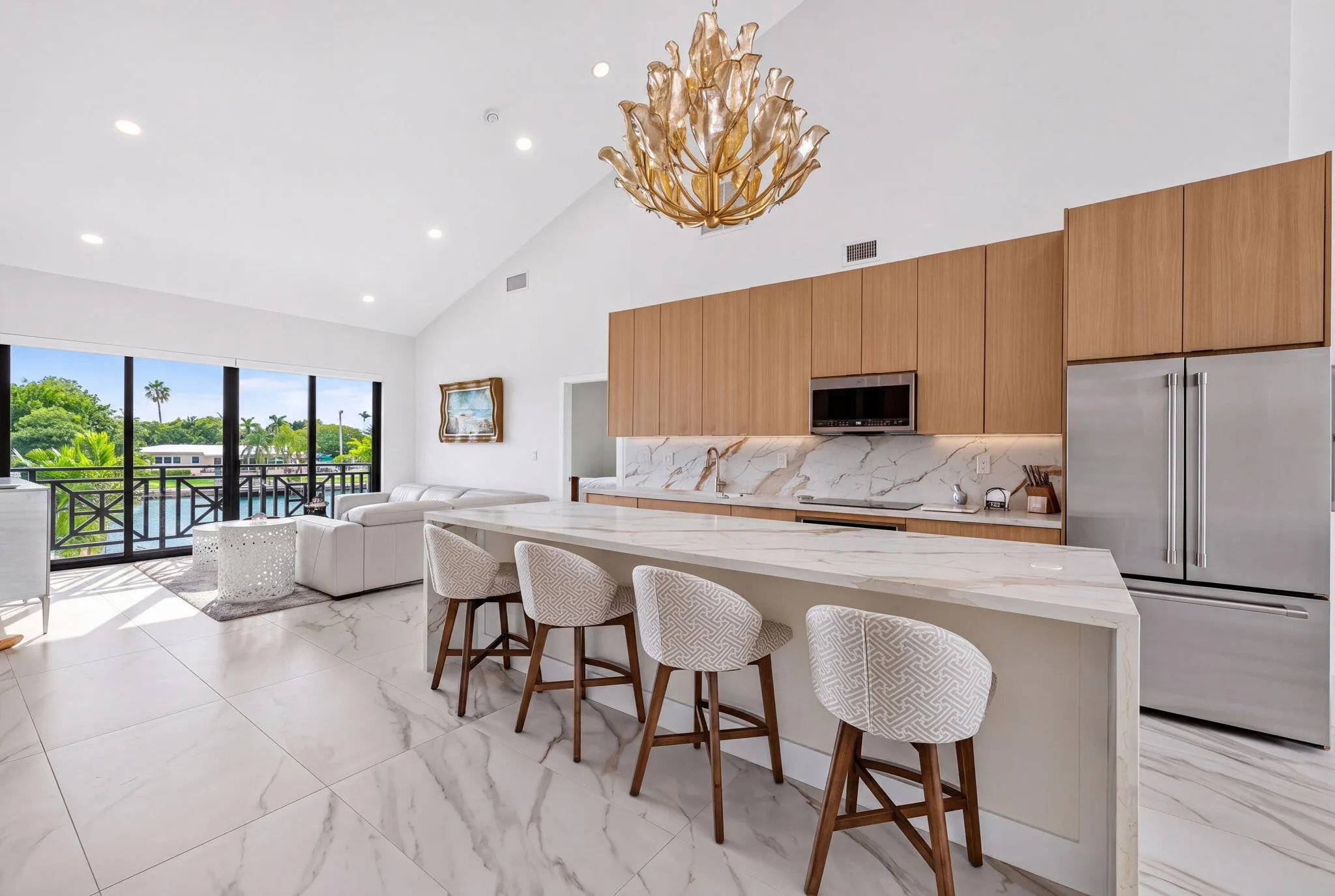 Living room adjacent to kitchen overlooking intracoastal