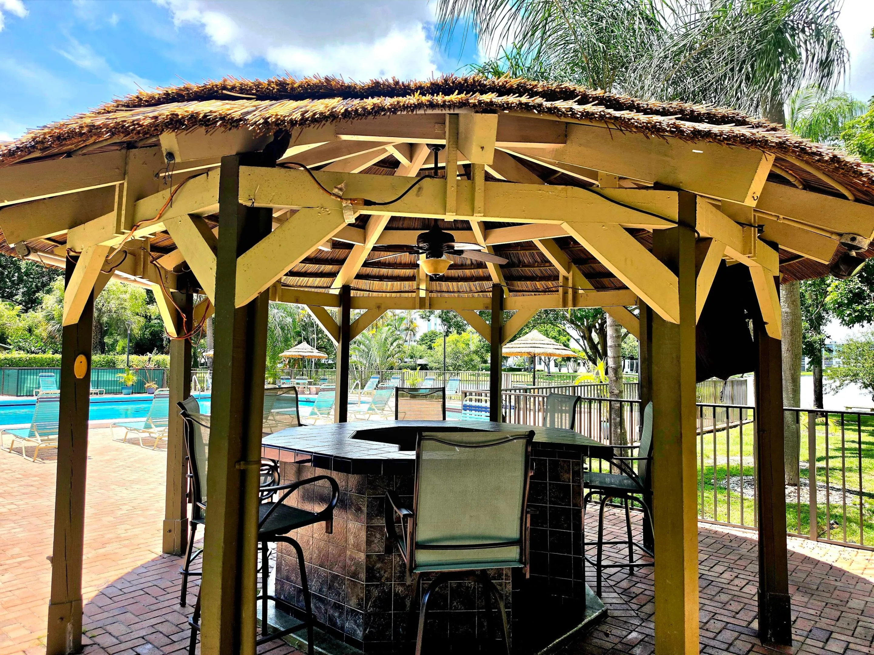 IF IT GETS TOO HOT... STEP UNDER THE POOLSIDE TIKI HUT