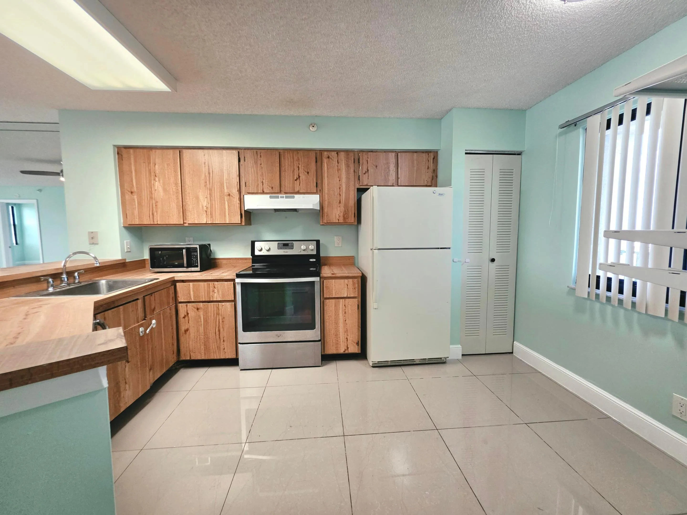 LOTS OF CABINETRY AND A PANTRY TO STORE ALL YOUR GOODS