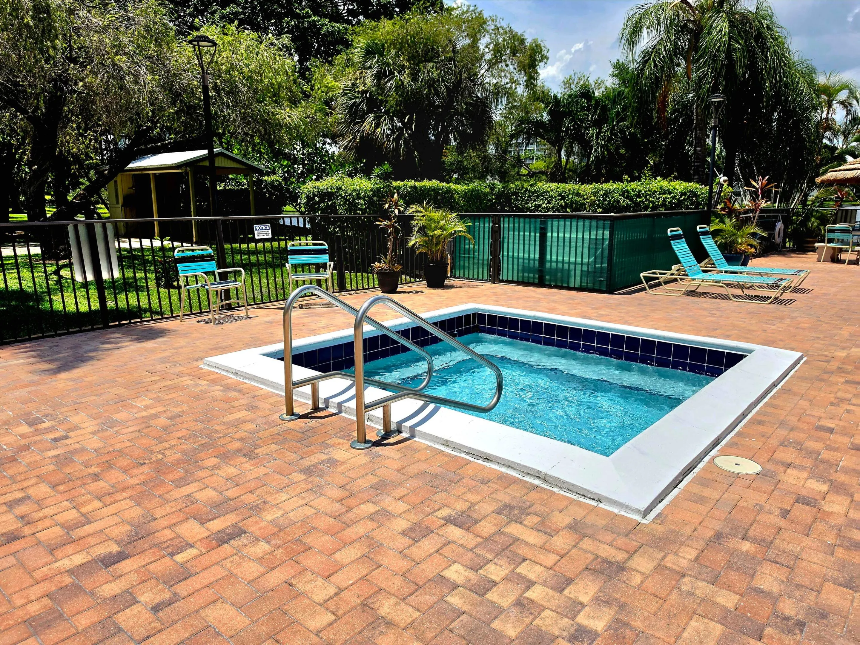 ENJOY THE POOLSIDE JACUZZI TO SOAK AWAY THE DAY