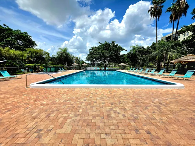YOUR COMMUNITY POOL WITH A LAKE VIEW