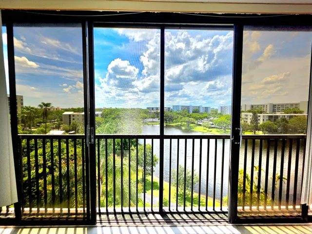 ENJOY YOUR BEAUTIFUL WATER VIEW. OPEN UP THE SLIDING DOORS FOR A BREEZE. THEY ARE ALSO SCREENED SO YOU MAY ENJOY