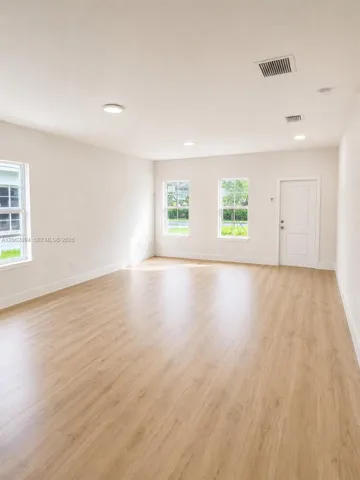 Open Concept Area with Sunlit Windows