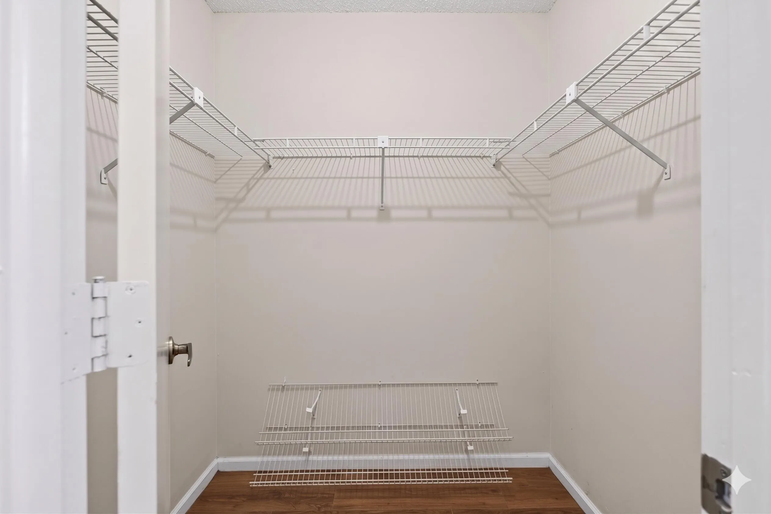 The primary has two large walk-in closets