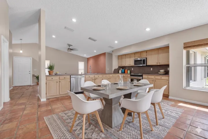 Please note that some photos have been virtually staged to show the home's possibilities. This property is a great opportunity to add your own style and build instant equity.