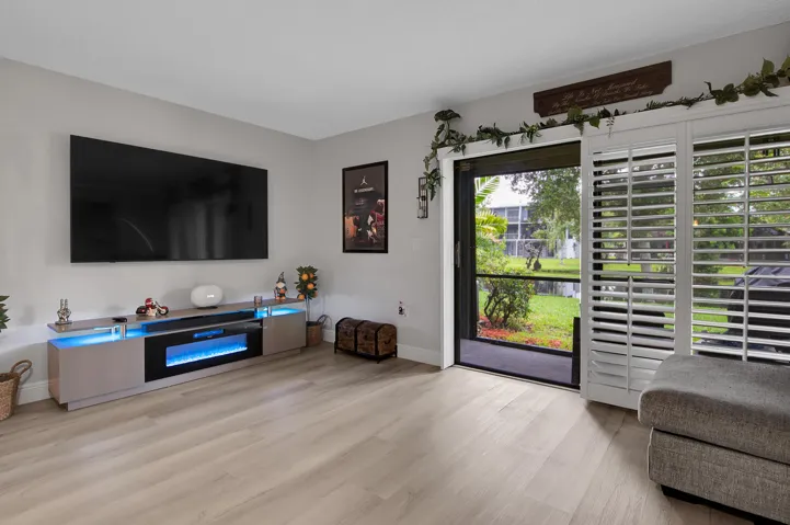 Spacious Living Area with Plantation Shutters