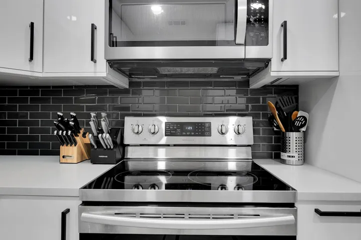 kitchen with modern backsplash