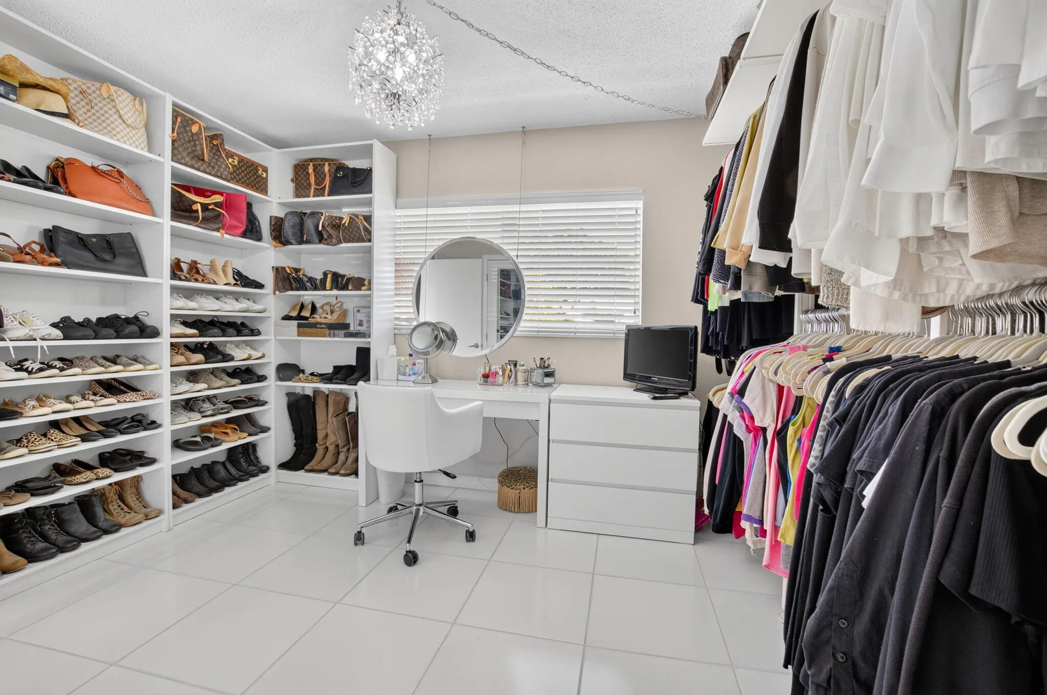 This is the 2nd bedroom. Owner has made it into incredible closet, flex space. Can easily convert back to 2nd bedroom.