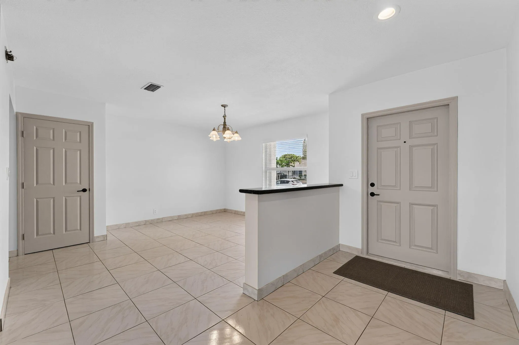 FOYER ENTRANCE OFF THE FORMAL DINING AREA