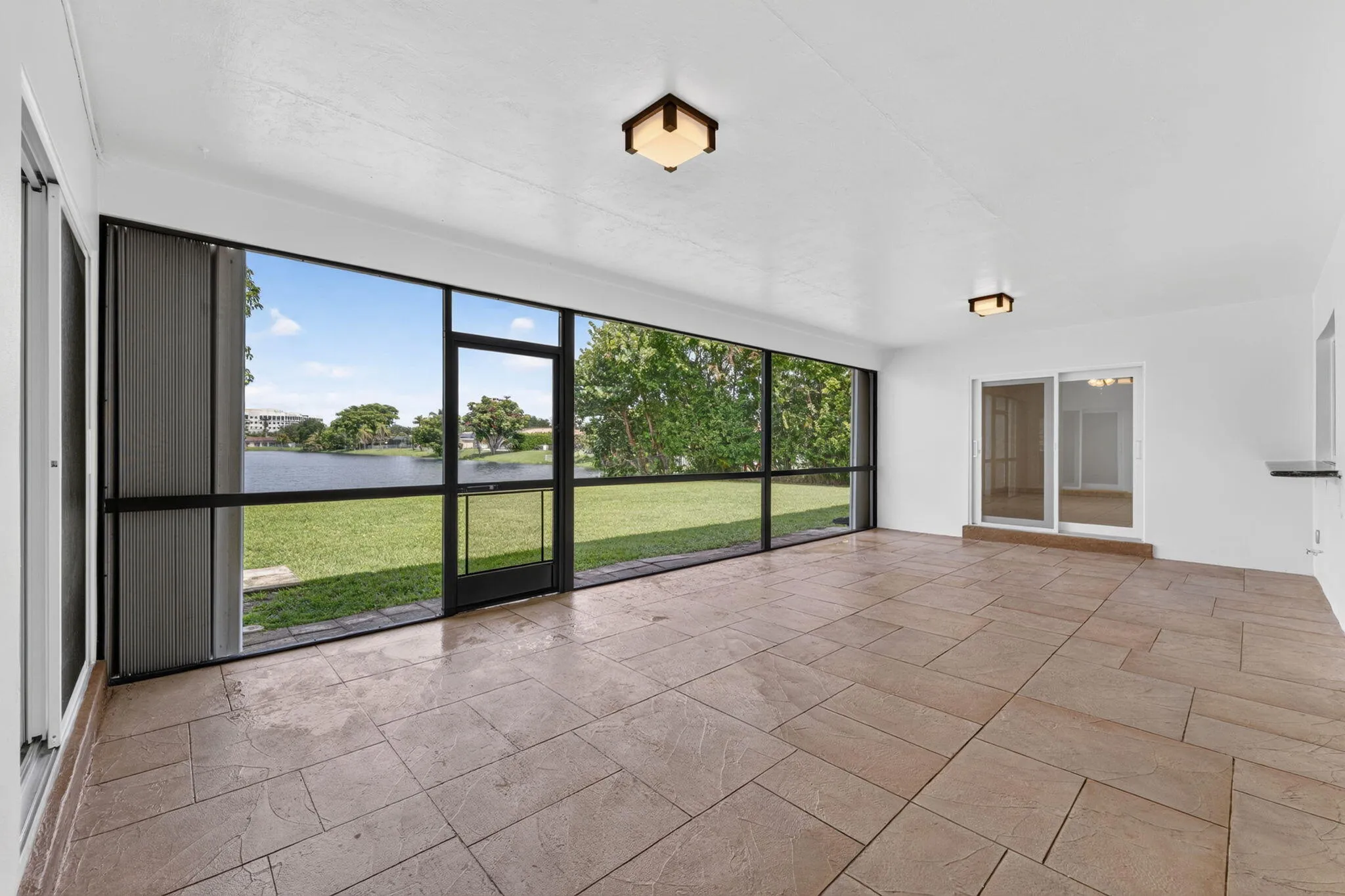 SCREENED IN PATIO OVER LOOKING THE LAKE