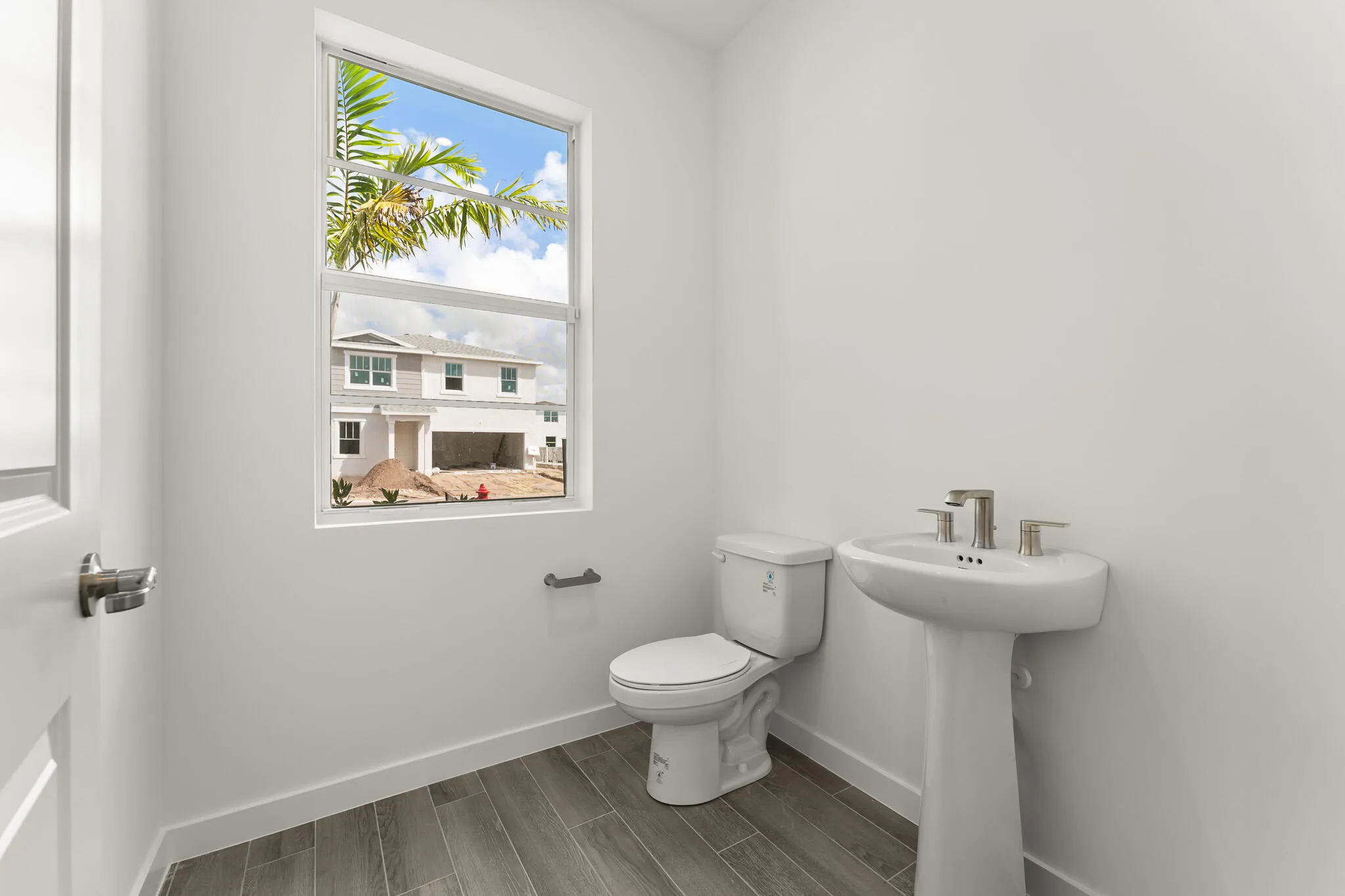 Stock photos represent builder's floorplan