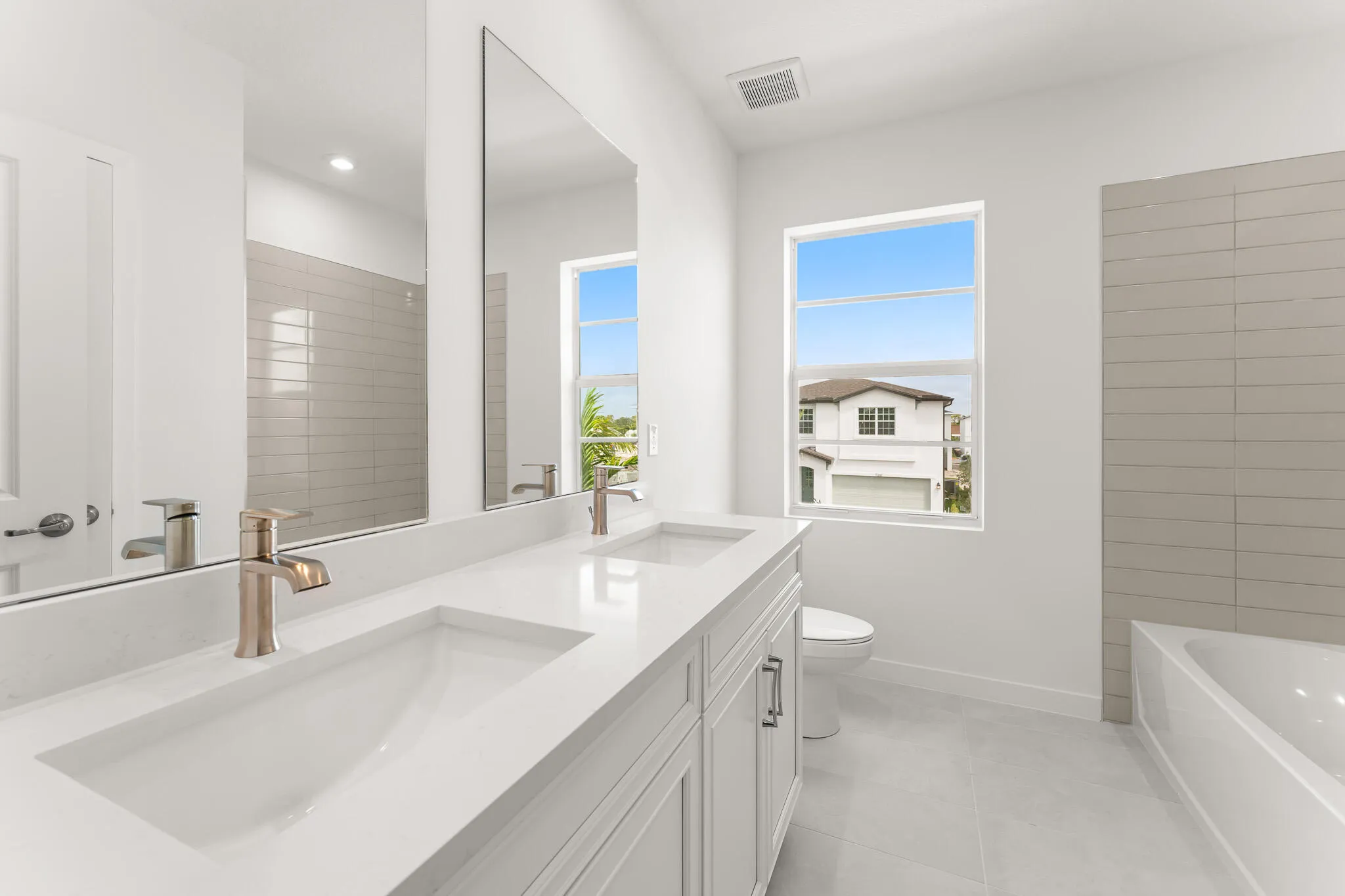 Stock photos represent builder's floorplan