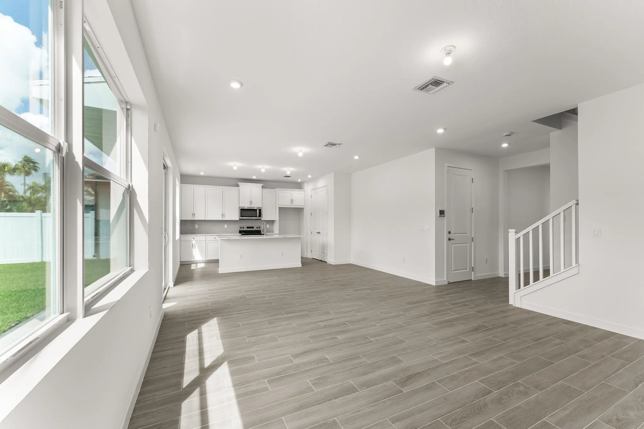 Stock photos represent builder's floorplan