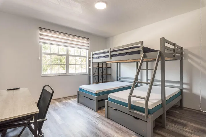 Neutral-toned room with wood-finish flooring