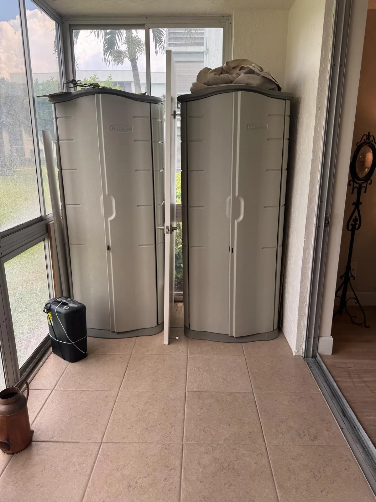 Tiled patio flooring features a screened enclosure with exterior views