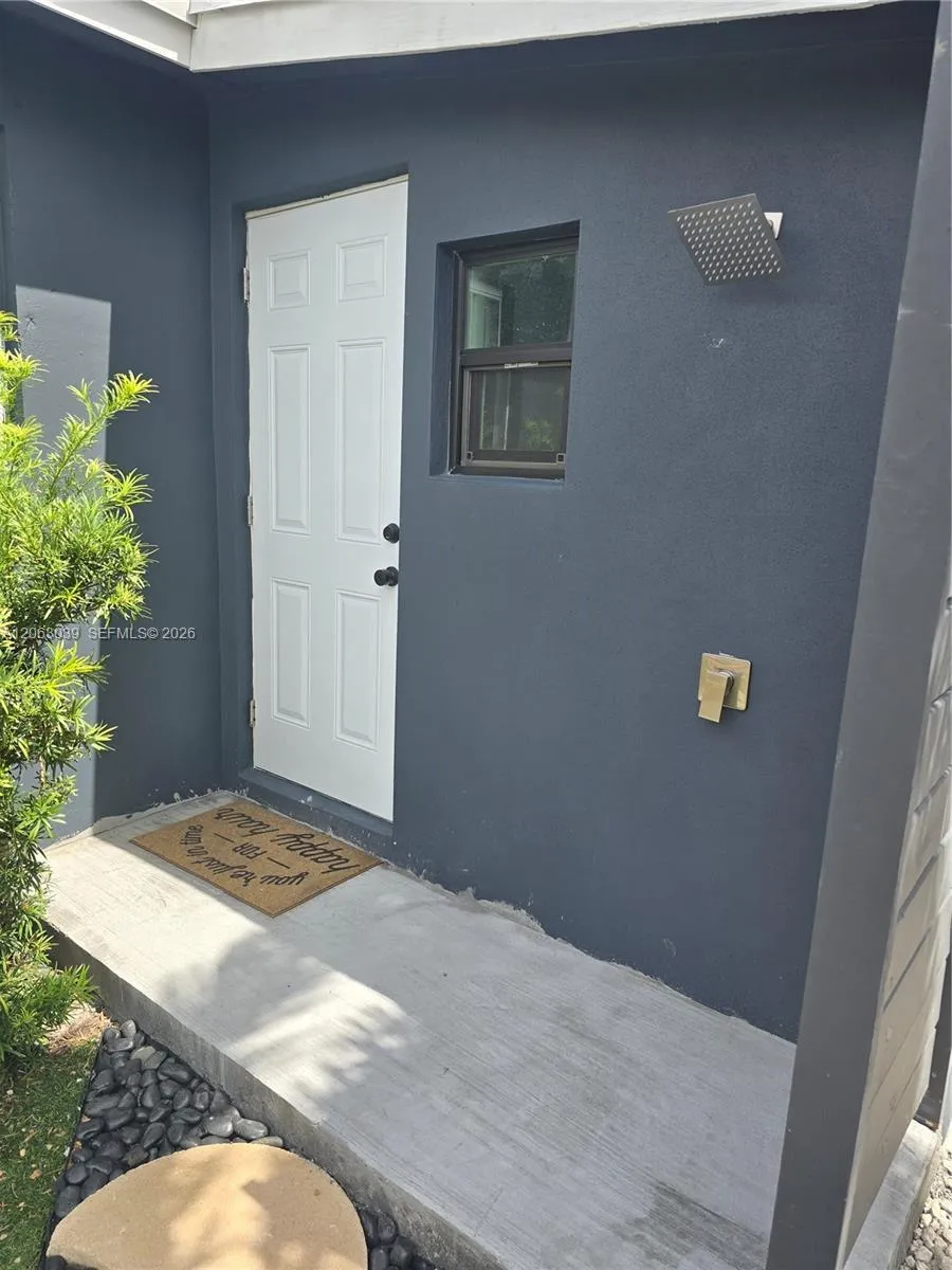 outdoor shower and door to enter in the bathroom