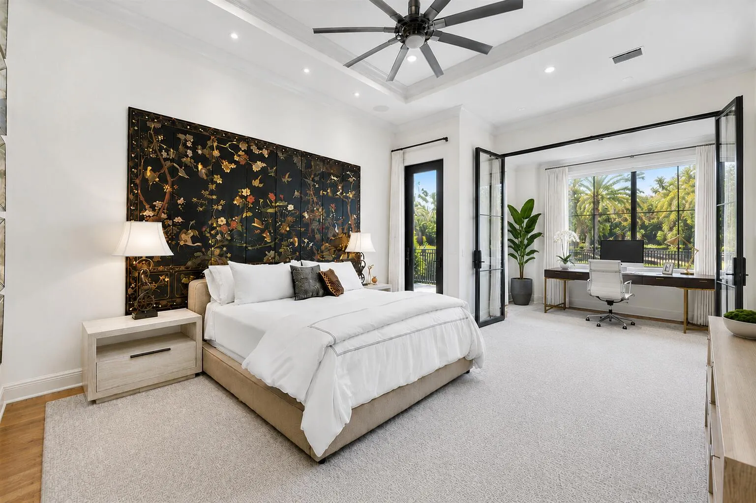 Primary bedroom with private access to the backyard (AS IS). Glass doors