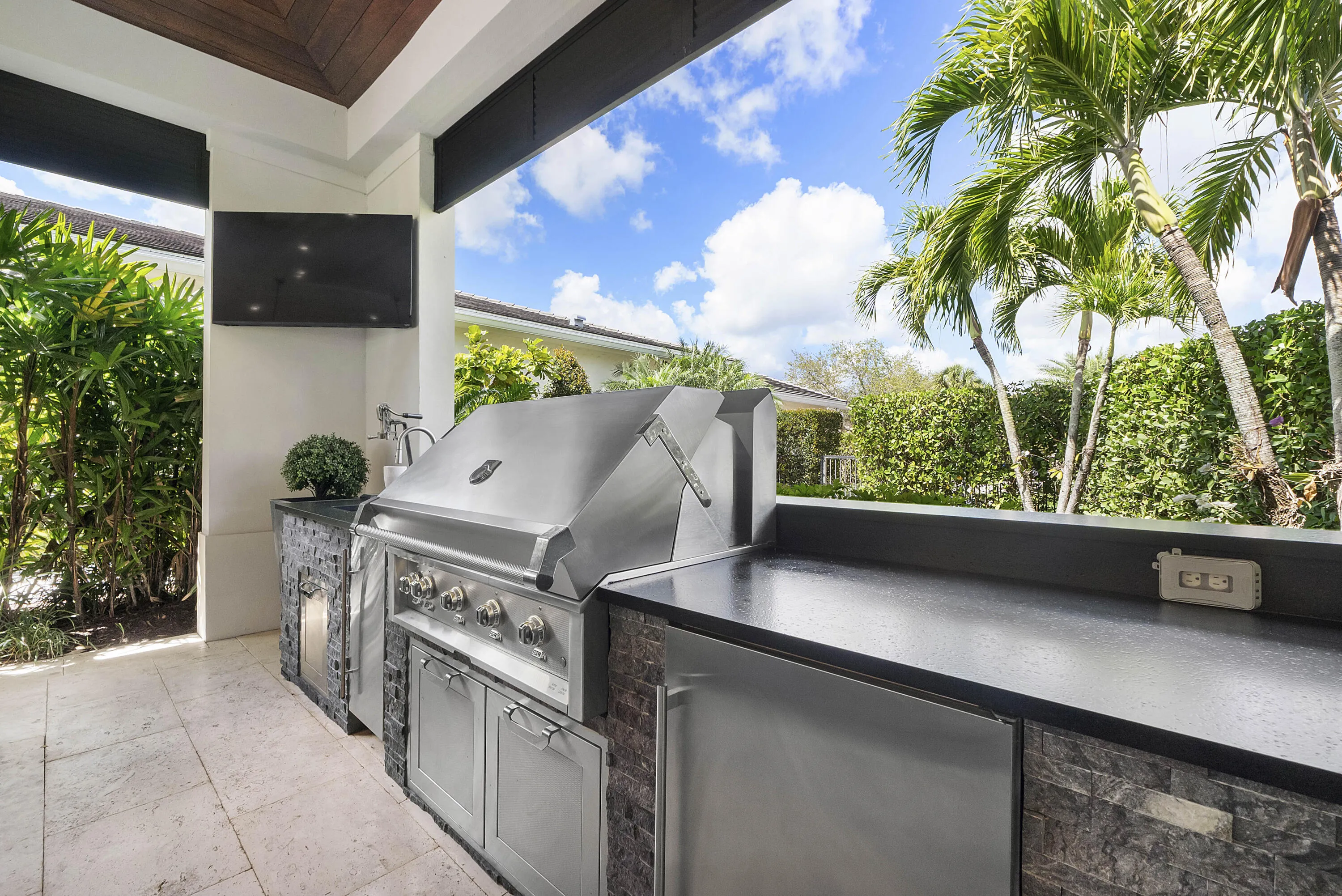 Propane Grill, Bar Fridge, and Ice Maker