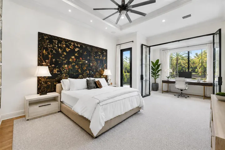 Primary bedroom with private access to the backyard (AS IS). Glass doors