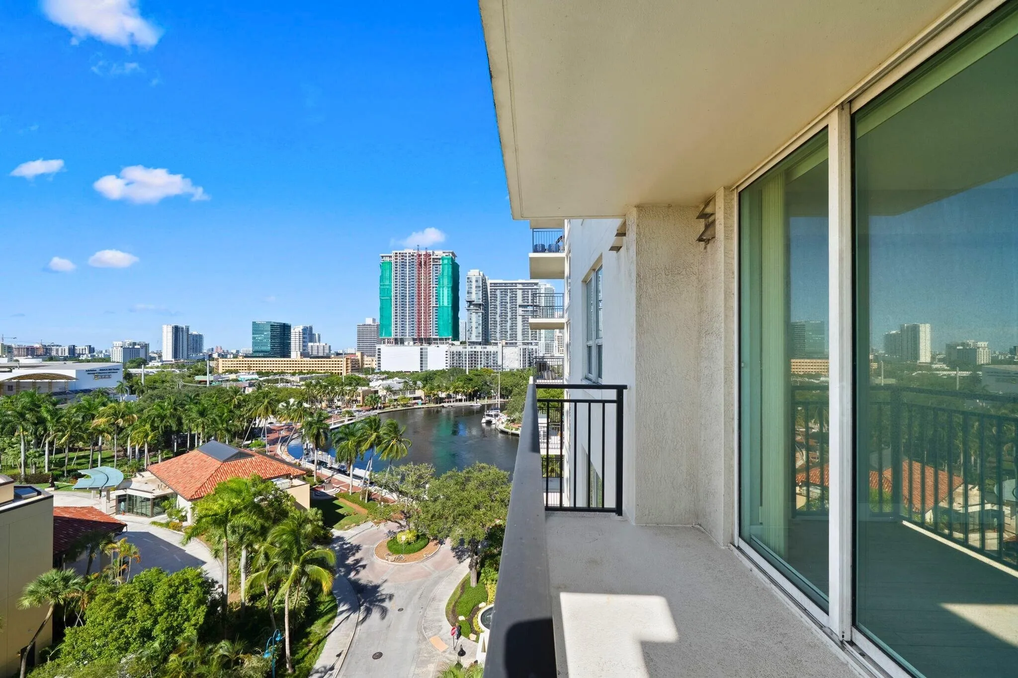 Private covered terrace off the main suite with elevated views of the New River, downtown skyline & surrounding Las Olas area.