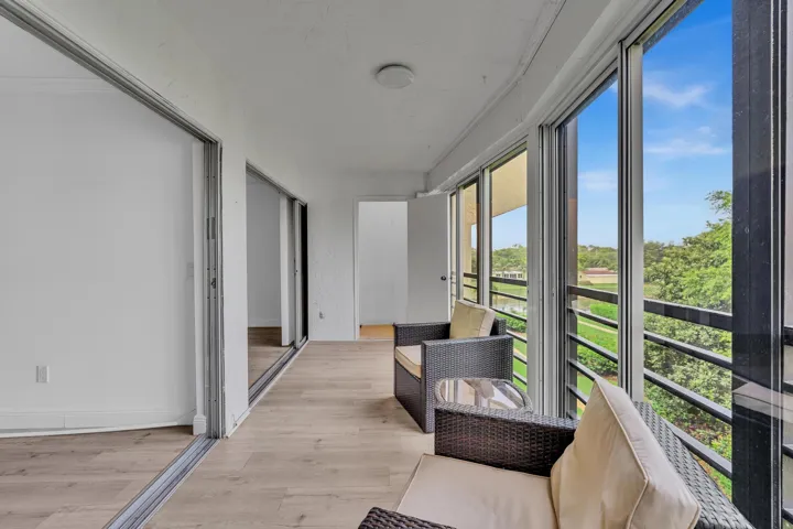 Balcony with screens, glass sliders