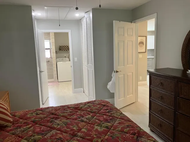 Interior space with light wood-finish flooring and neutral wall tones