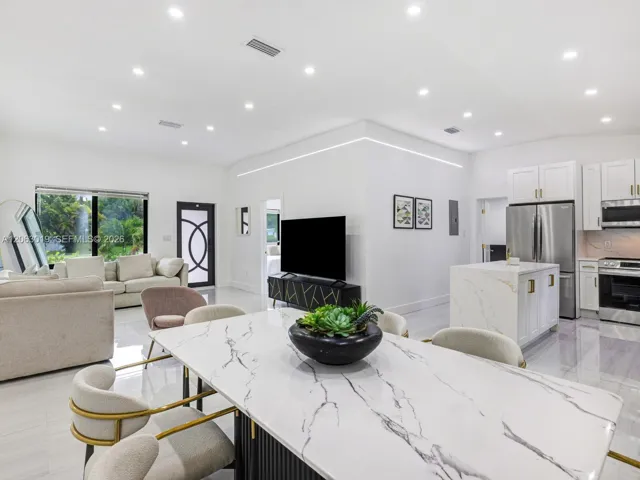 Open-Flow Living/Dining/Kitchen with Volume Ceilings