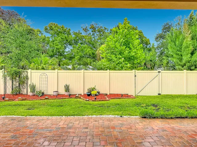 beautifully landscaped and fenced yard