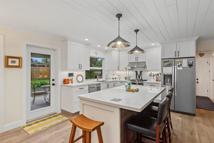 Kitchen island, exit to backyard patio
