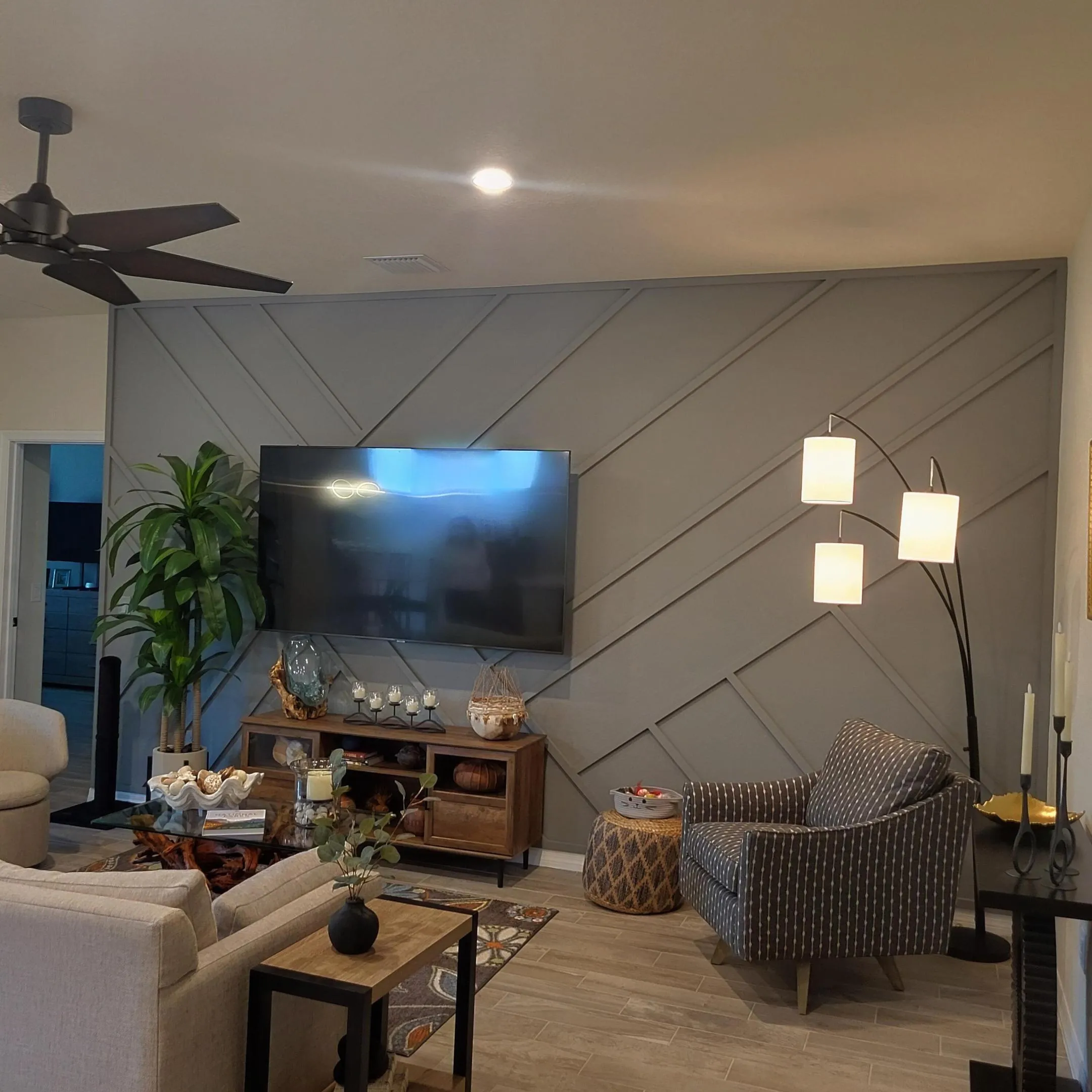 LIVING AREA WITH DESIGNER ACCENT WALL