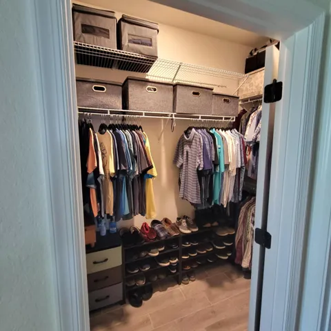 ONE OF TWO WALK IN CLOSETS
