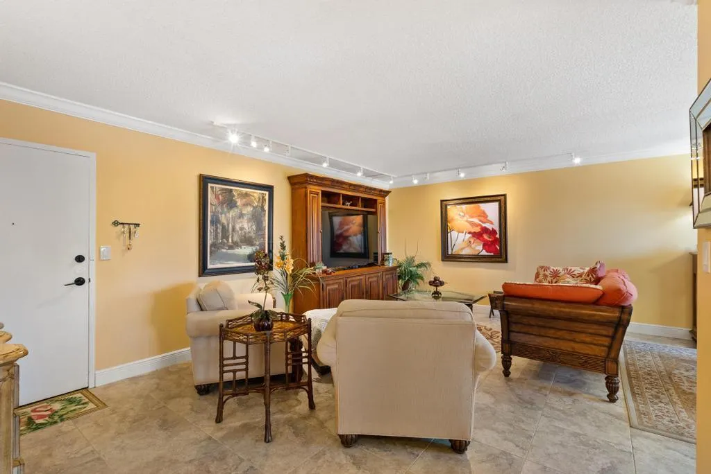 Living room furnished w/a "Tommy Bahama" decor