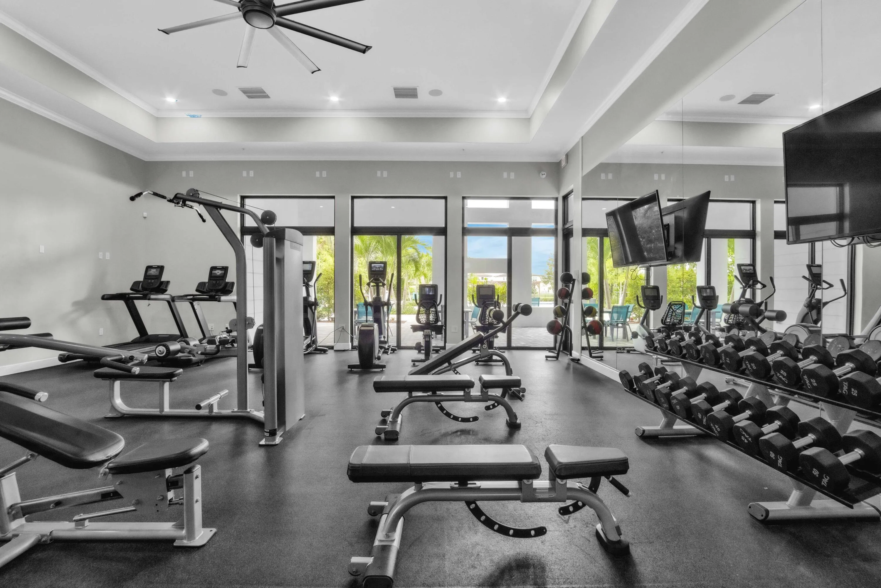 Stay active in the well-equipped community fitness center overlooking the pool area.