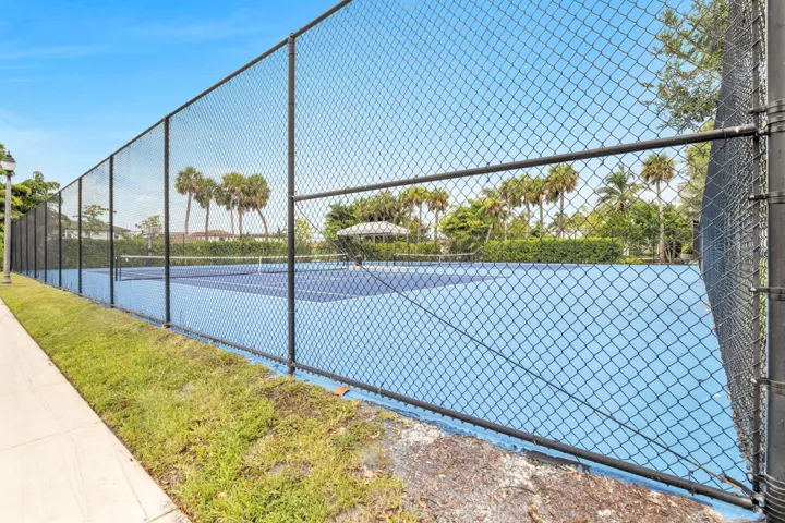 Lighted tennis courts are also included.