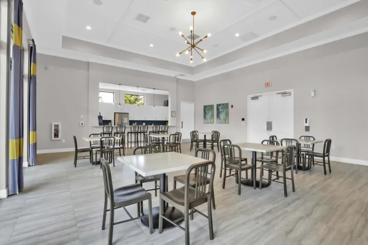 A spacious event and dining room inside the clubhouse is well-suited for community gatherings and social events.