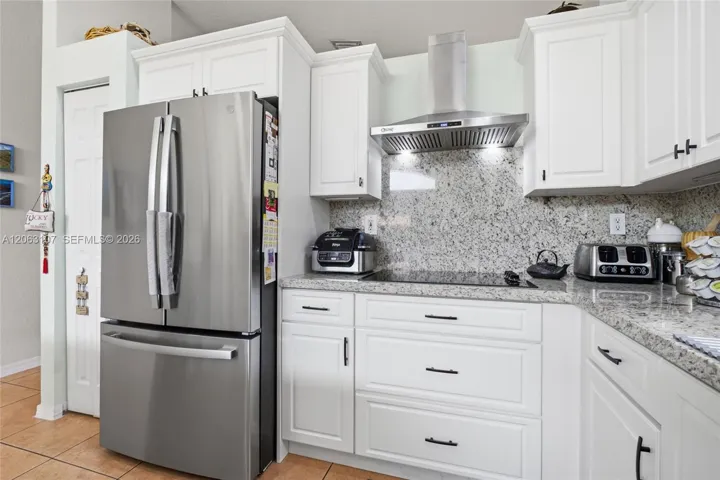 Top stove mount in granite counter