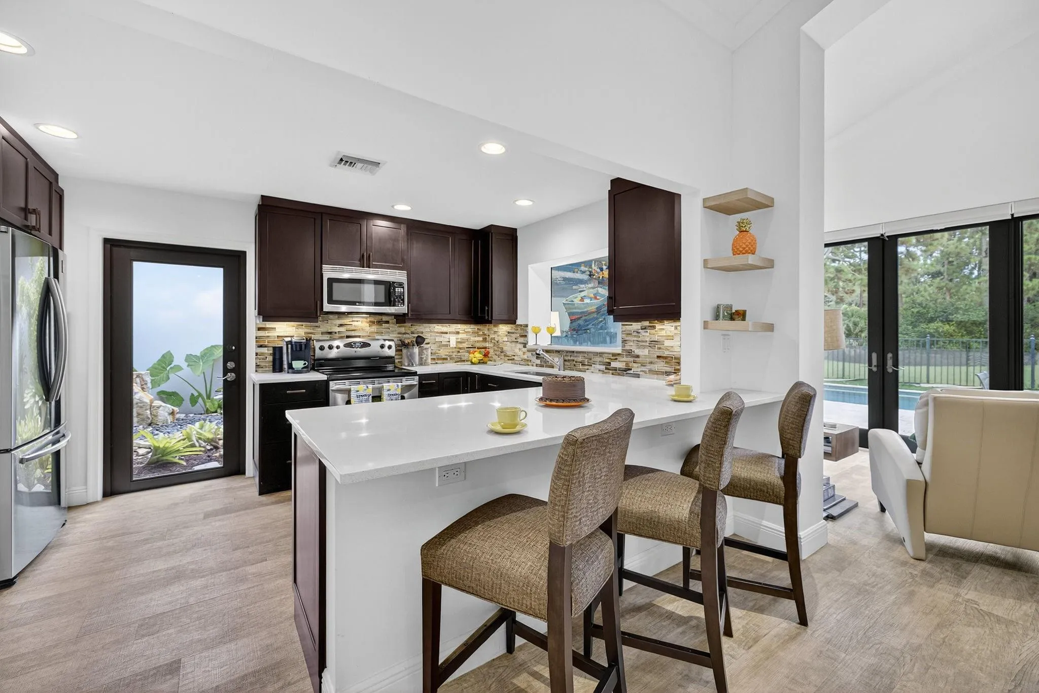 Entertaining is a breeze in your wide-open kitchen with a pass thru to family room.