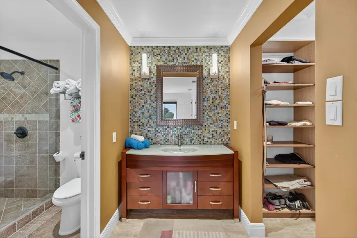 Primary bath with counter height vanity.