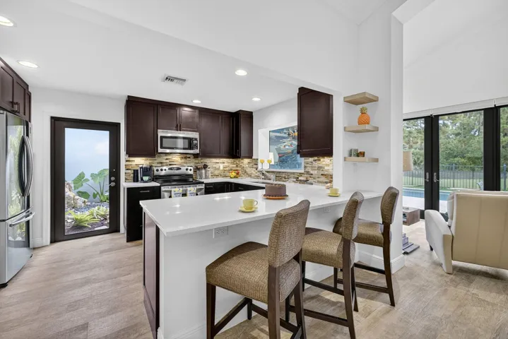 Entertaining is a breeze in your wide-open kitchen with a pass thru to family room.