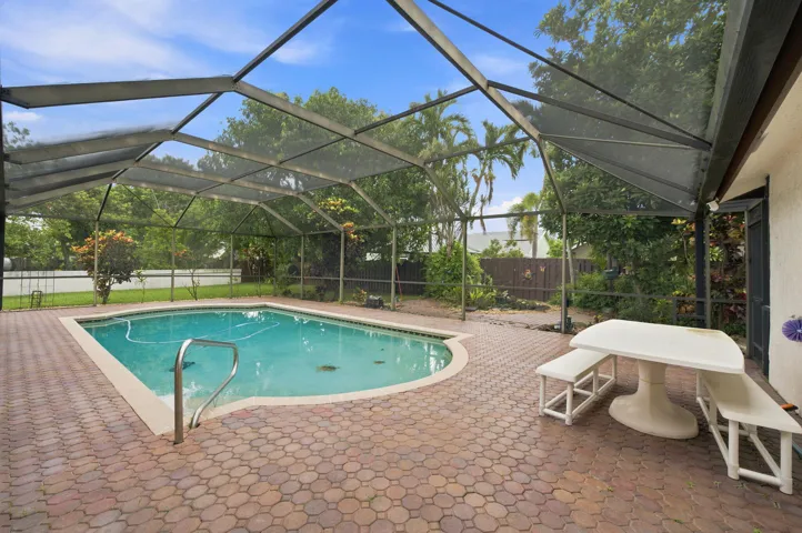 NICE SIZE POOL AND EXTRA PATIO SPACE