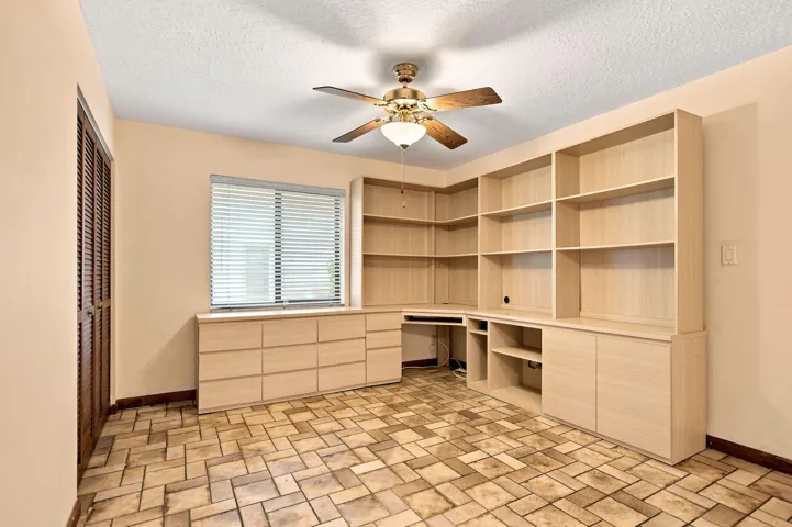 EXTRA SPACE IN FAMILY ROOM WAS USED AS AN OFFICE