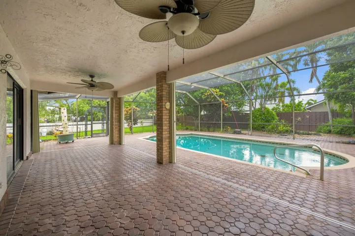 BIG PAVER ROOFED SCREENED PATIO AREA