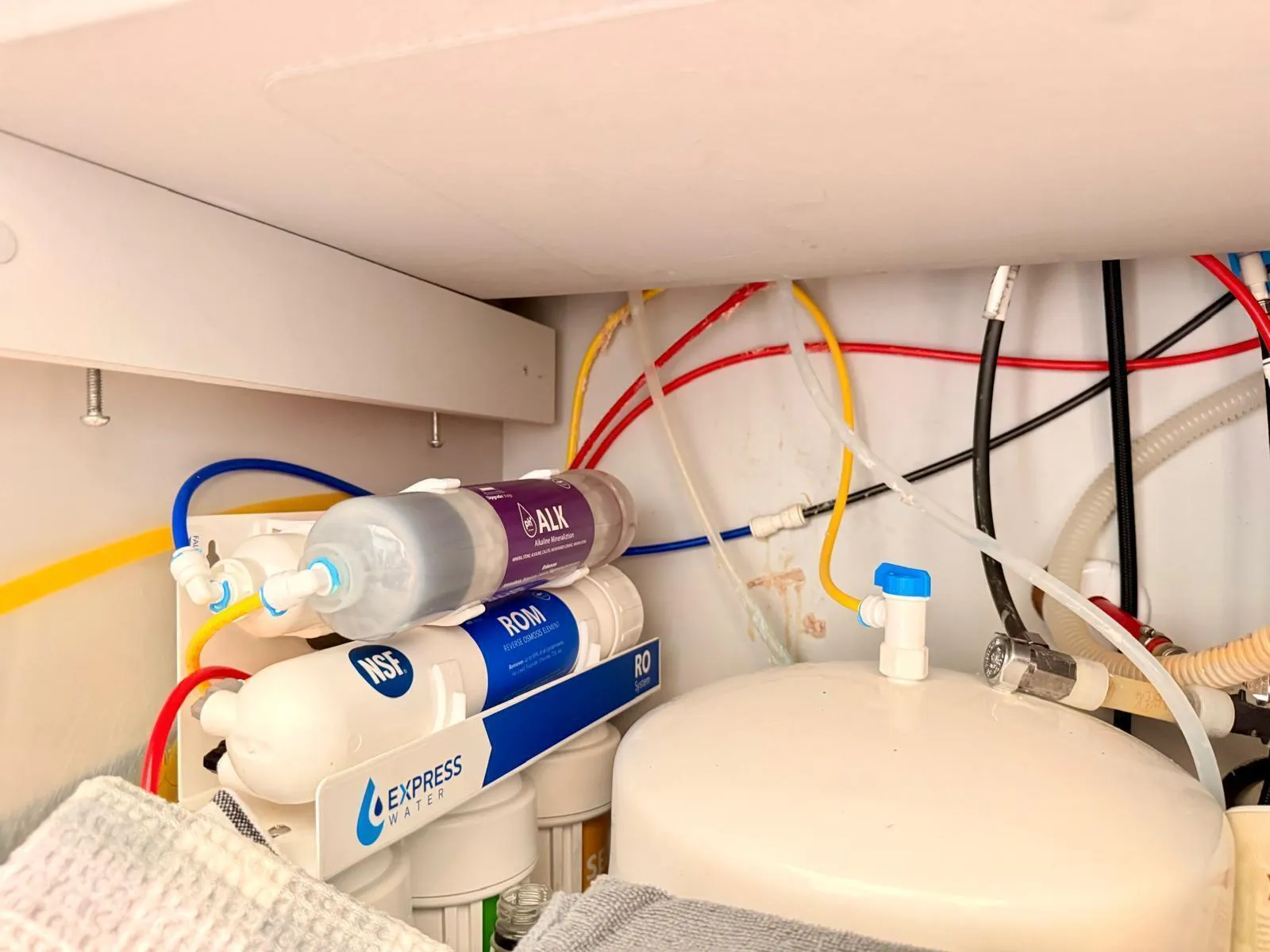 Dedicated under-sink water filtration system providing filtered water directly at the kitchen sink.