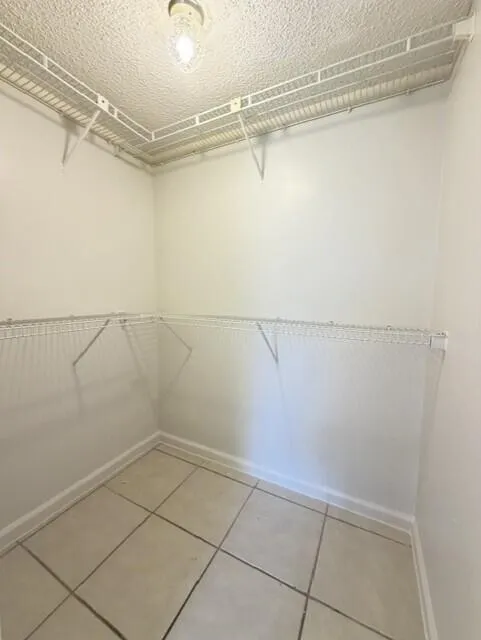 PRIMARY BEDROOM WALK IN CLOSET