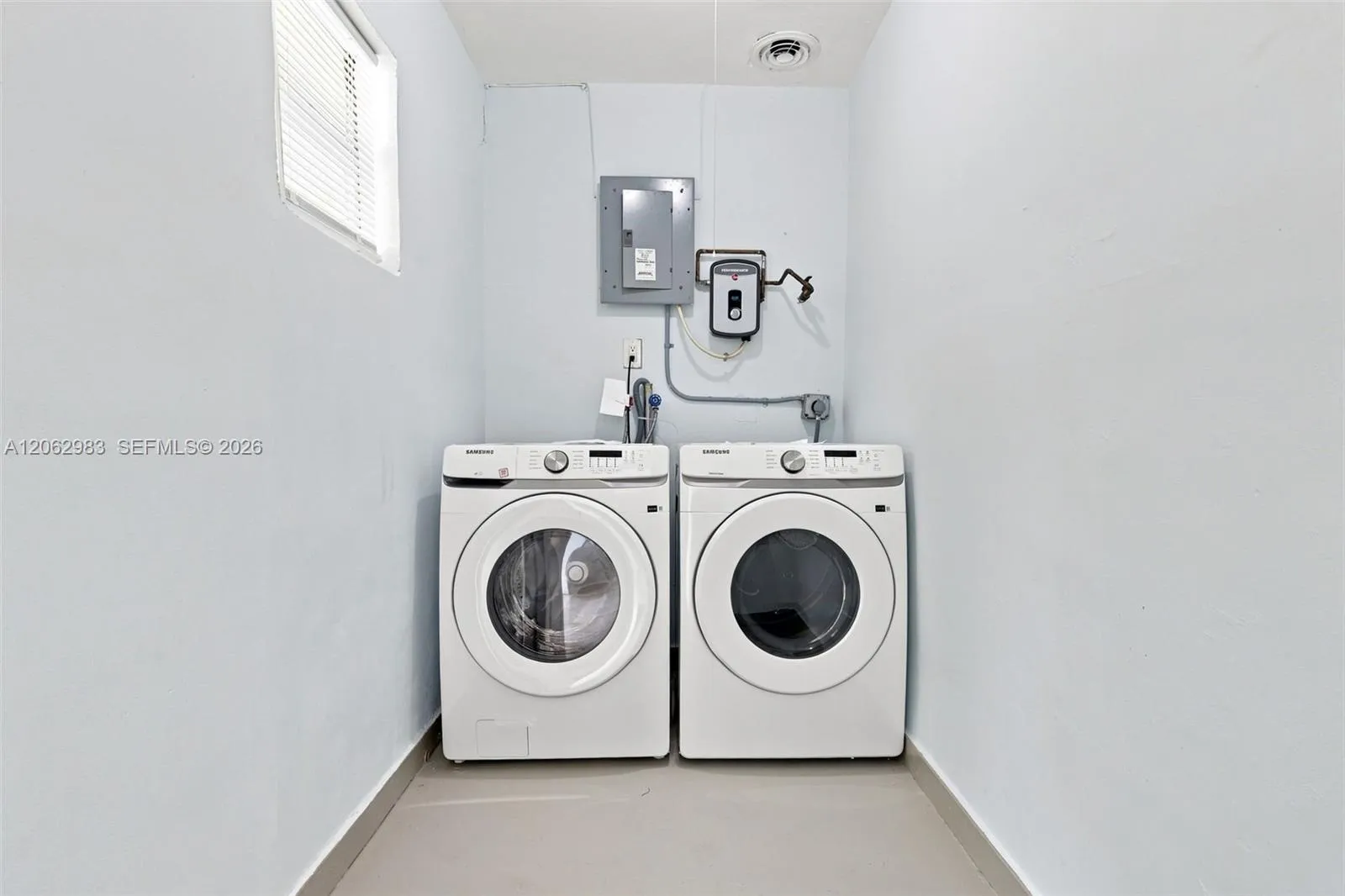 Brand New Front Load Washer and Dryer. Tankless Water Heater