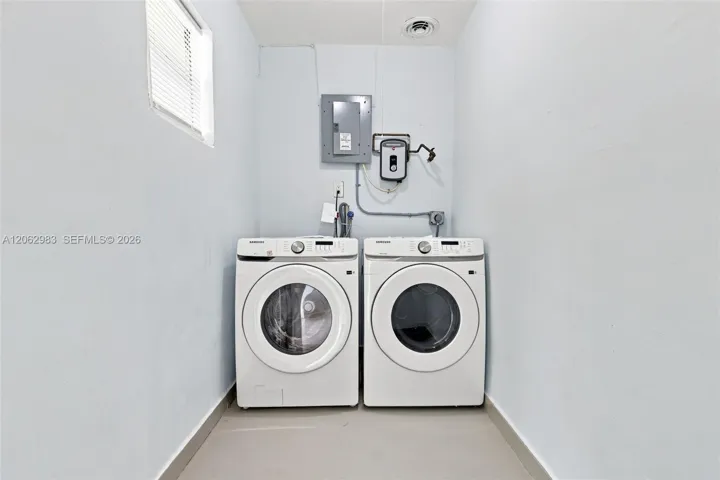 Brand New Front Load Washer and Dryer. Tankless Water Heater