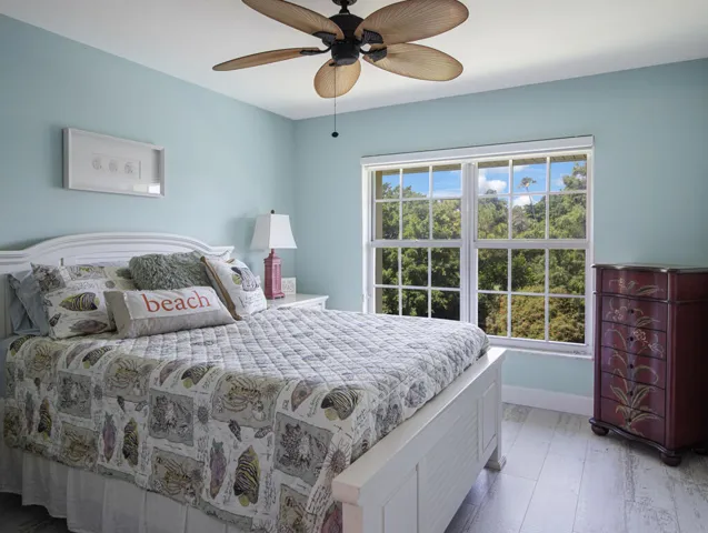 2nd bedroom with water and golf view.